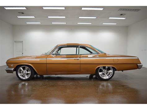 65,900 Dealership Showcased CC-1624415 1960 Chevrolet Impala Orange Metallic exterior, Light Gray Leather interior. . 1962 impala bubble top for sale